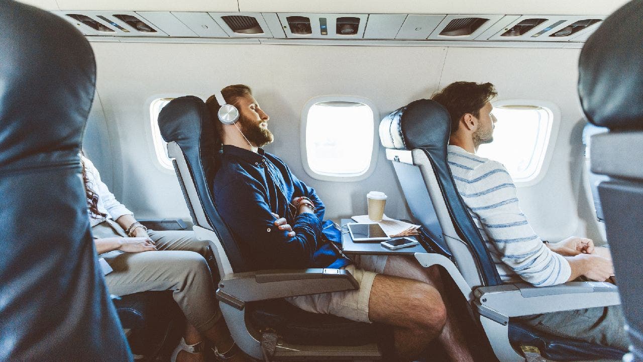 Passenger's reclined plane seat seen in TikTok video reawakens debate: 'Bane of my existence'