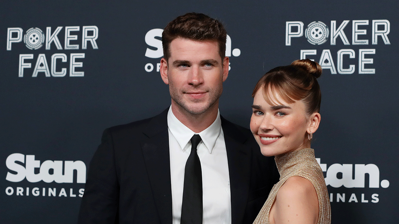 Liam Hemsworth makes red carpet debut with girlfriend Gabriella Brooks at 'Poker Face' premiere