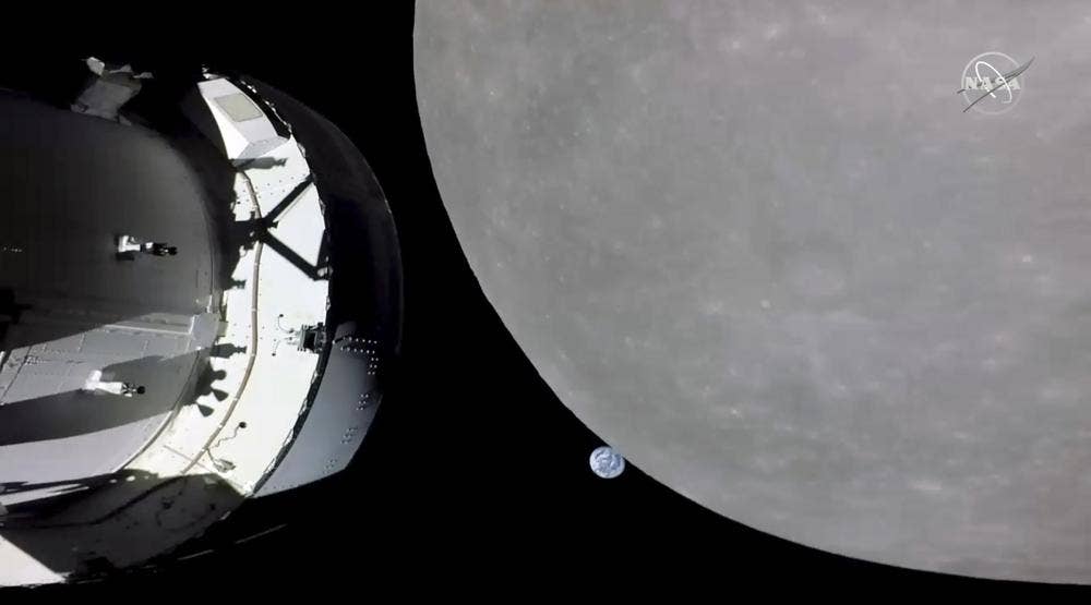 News :NASA space capsule rounds the moon