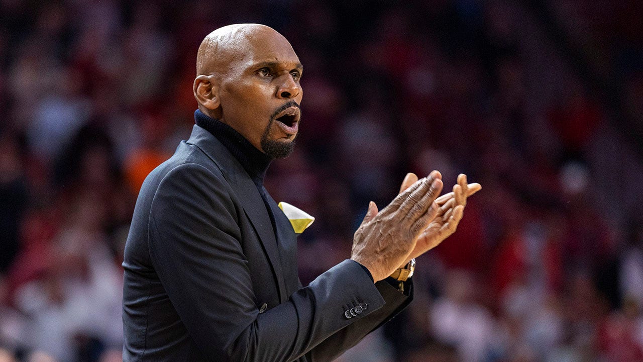 Jerry Stackhouse, Vanderbilt head coach, restrained from referees after fiery ejection