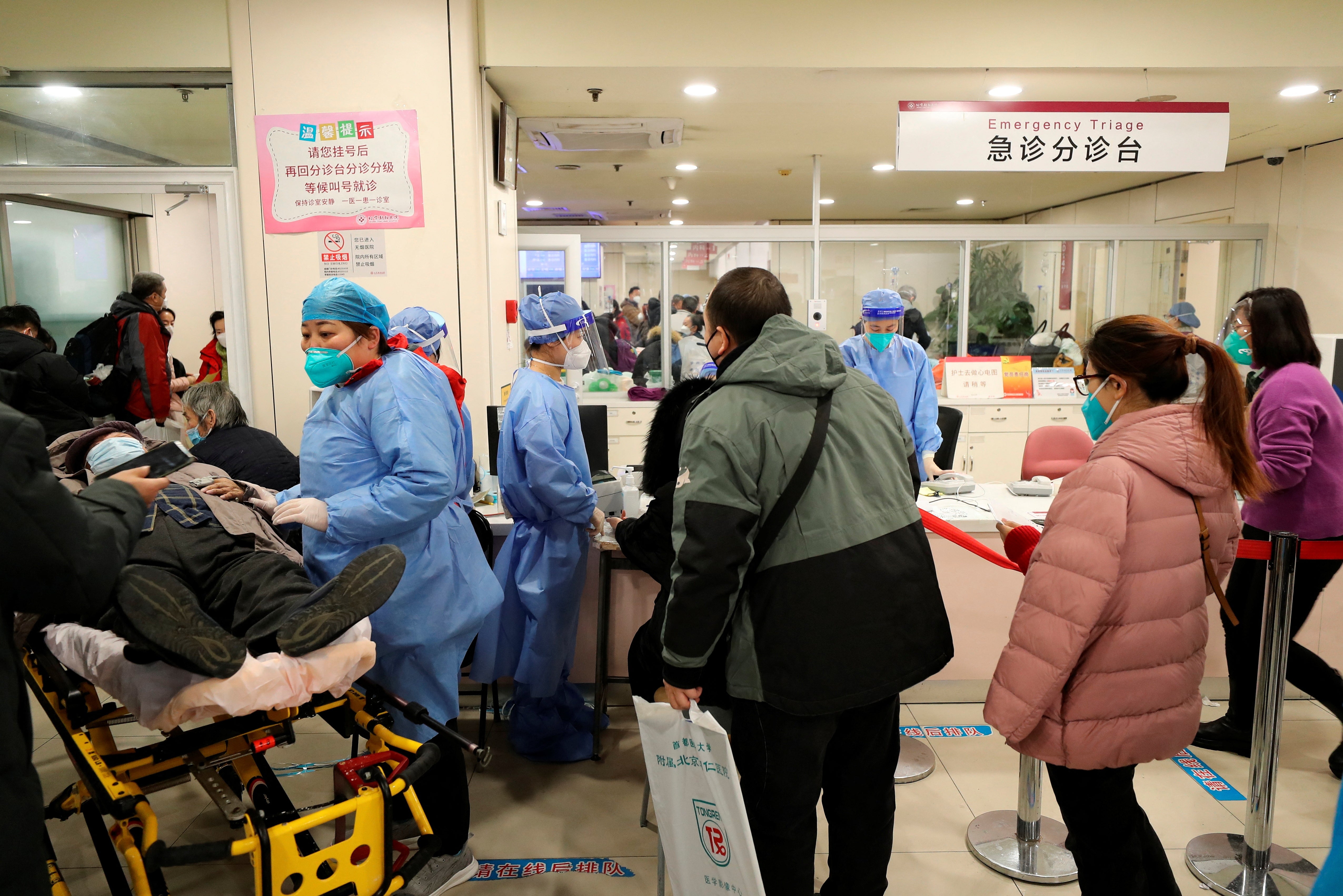 COVID in Beijing ‘peaks’ as hospitals, funeral homes fill up