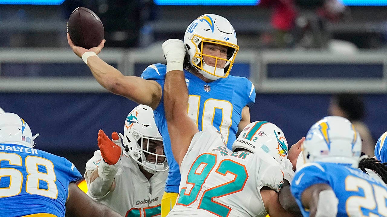 NFL followers upset as Dolphins flagged for roughing the passer on Justin Herbert hit