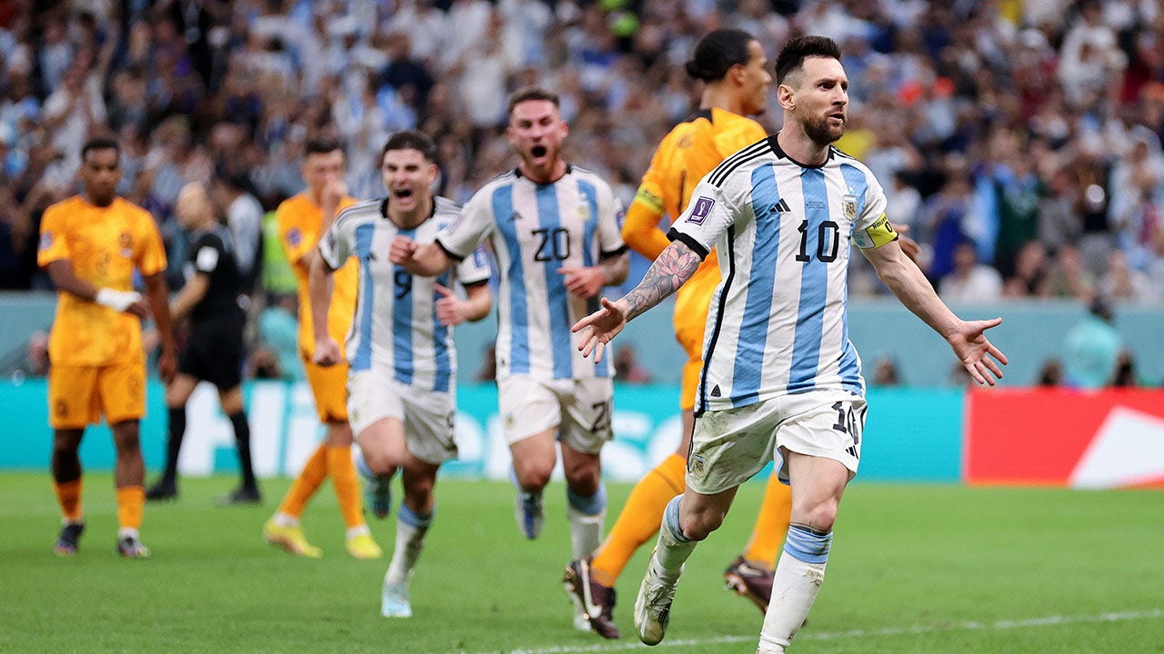 Lionel Messi and Argentina celebrate after advancing to 2022 World