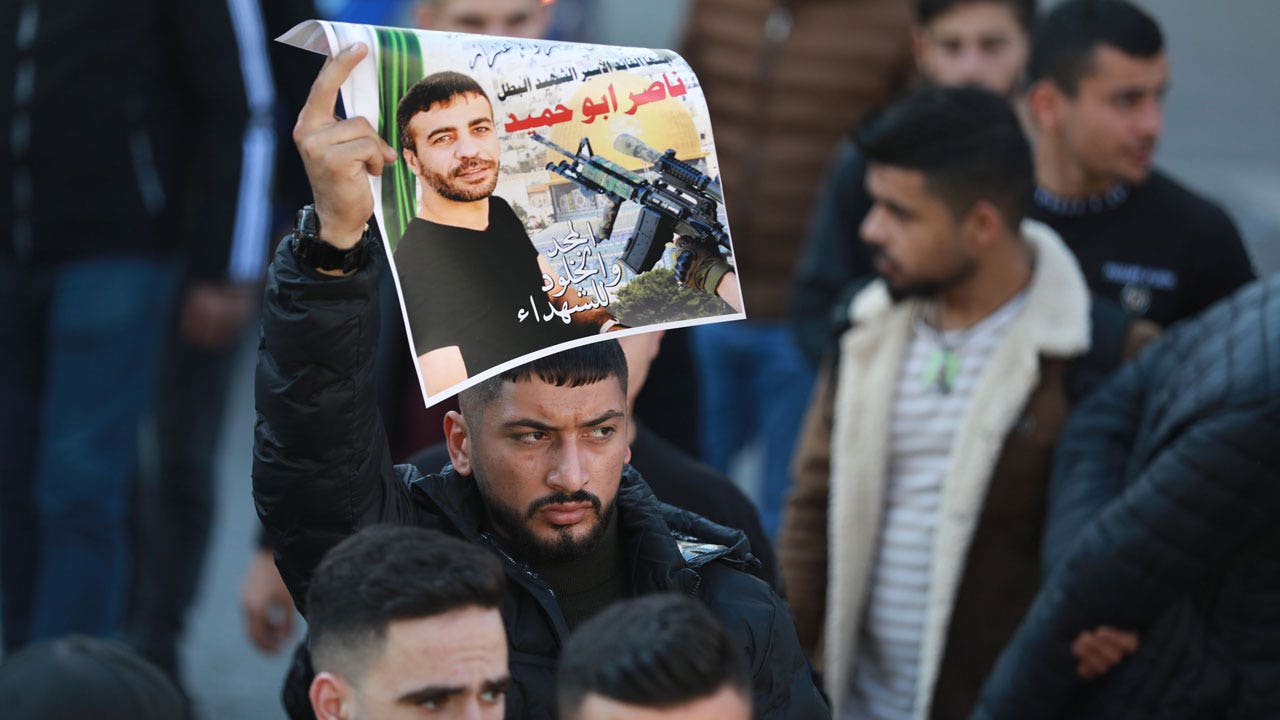 Palestinians call for strike in West Bank after prisoner dies of lung cancer
