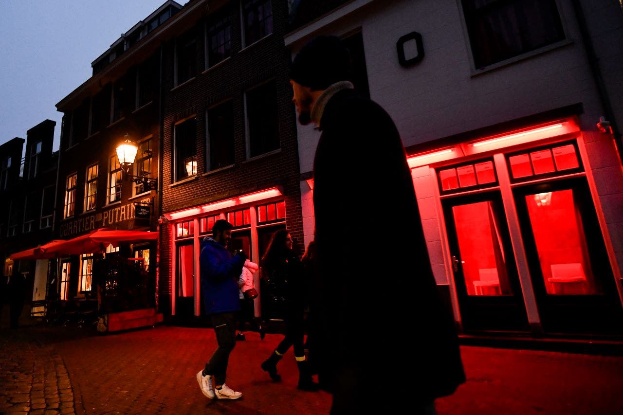 Amsterdam looks to ban red light district workers from windows to nuisance | Fox News
