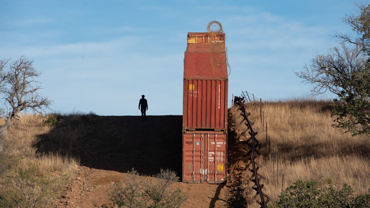 Arizona agrees to take down shipping container border wall to settle Biden lawsuit