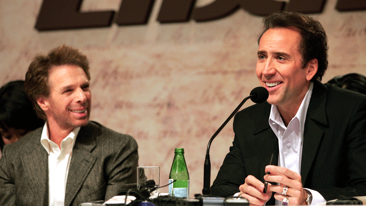 Jerry Bruckheimer and Nicolas Cage speaking at "National Treasure" press conference
