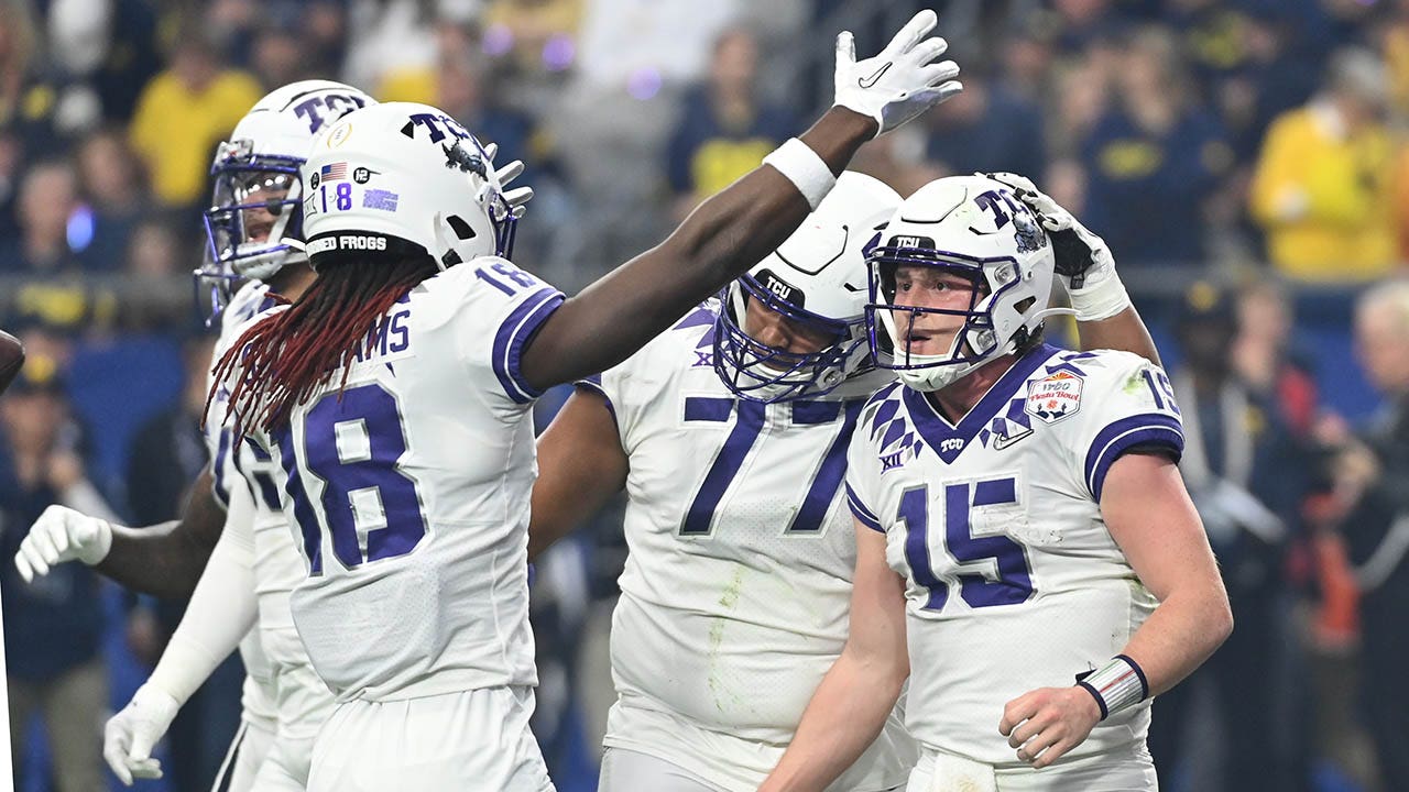 TCU pulls off biggest upset in CFP history with victory over Michigan in Fiesta Bowl