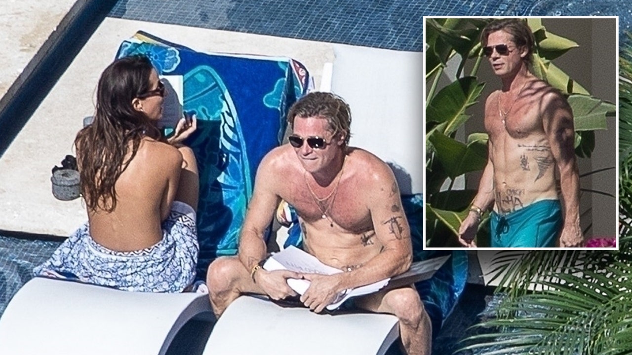 Brad Pitt sunbathes with topless girlfriend Ines de Ramon in Mexico amid  'semi-retirement' plans