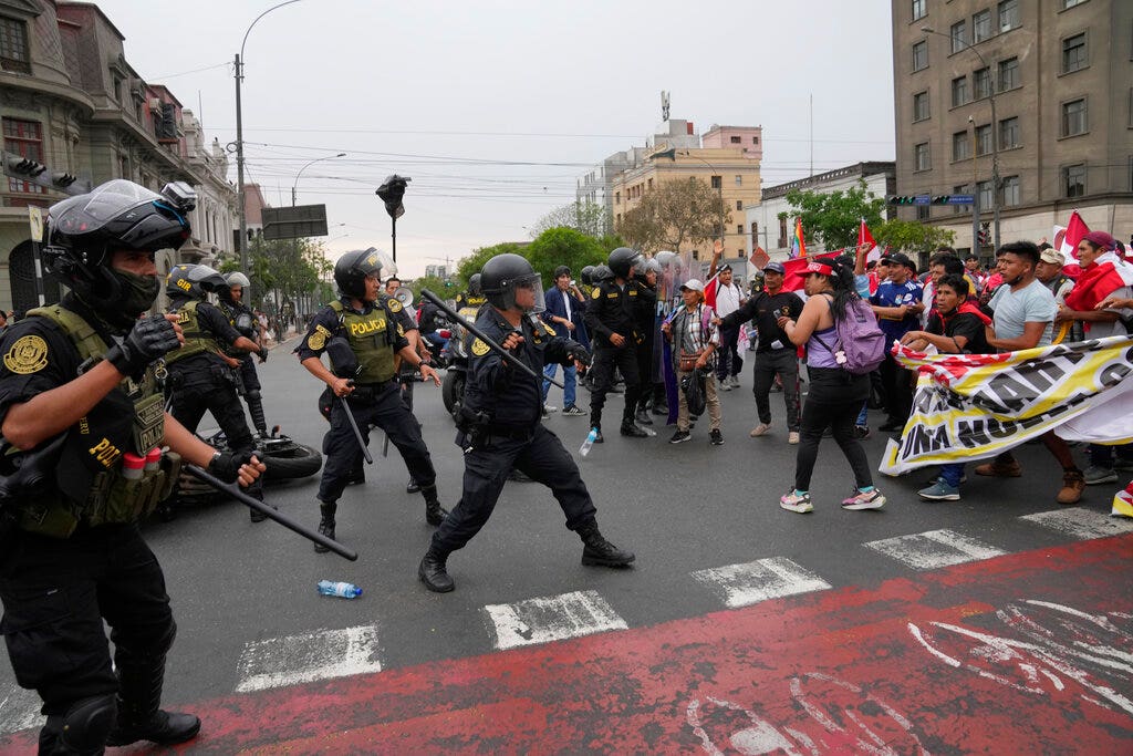 Police, protesters in Peru's capital clash as demands for president's resignation grow