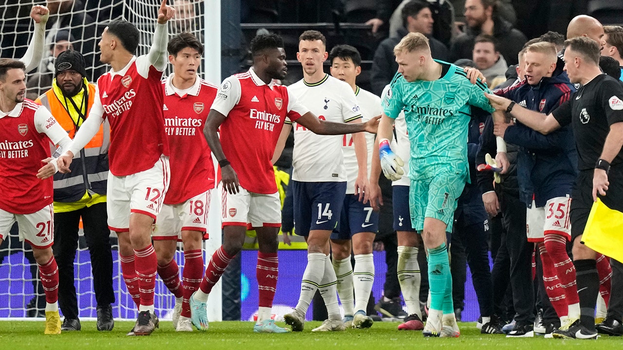 Arsenal's Aaron Ramsdale kicked by fan after win at Tottenham, Premier  League