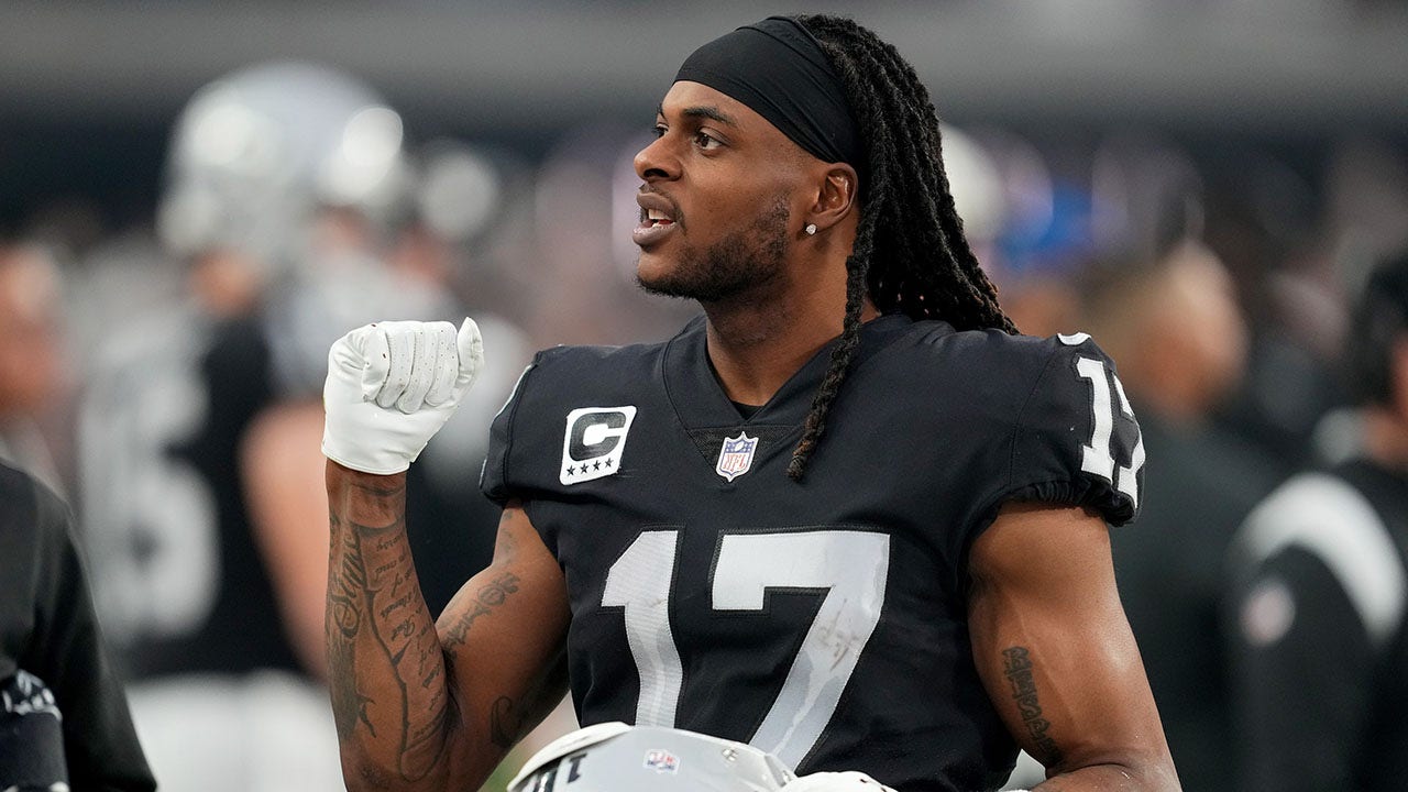 Raiders' Davante Adams 'absolutely' wants to remain with Las Vegas despite  uncertainty around Derek Carr