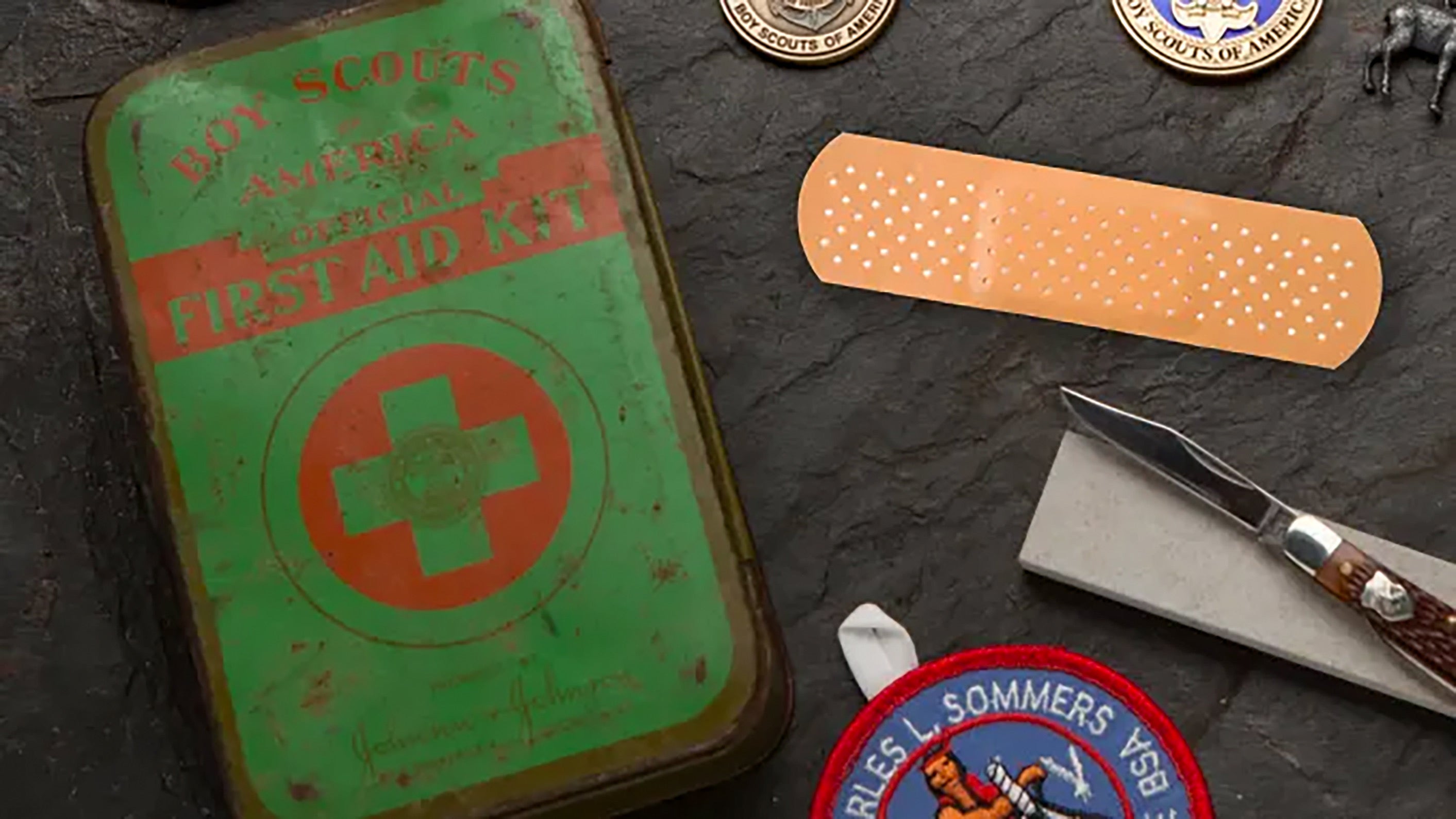 Johnson & Johnson helped popularize Band-Aids by packing them in first-aid kits for Boy Scouts. After an initial kit came in a simple cardboard box, Johnson & Johnson debuted an upgraded BSA first-aid kit in a tin box. Inside, scouts found burn and antibiotic creams, first-aid instructions and several kinds of bandages, including Band-Aids. (Boy Scouts of America)