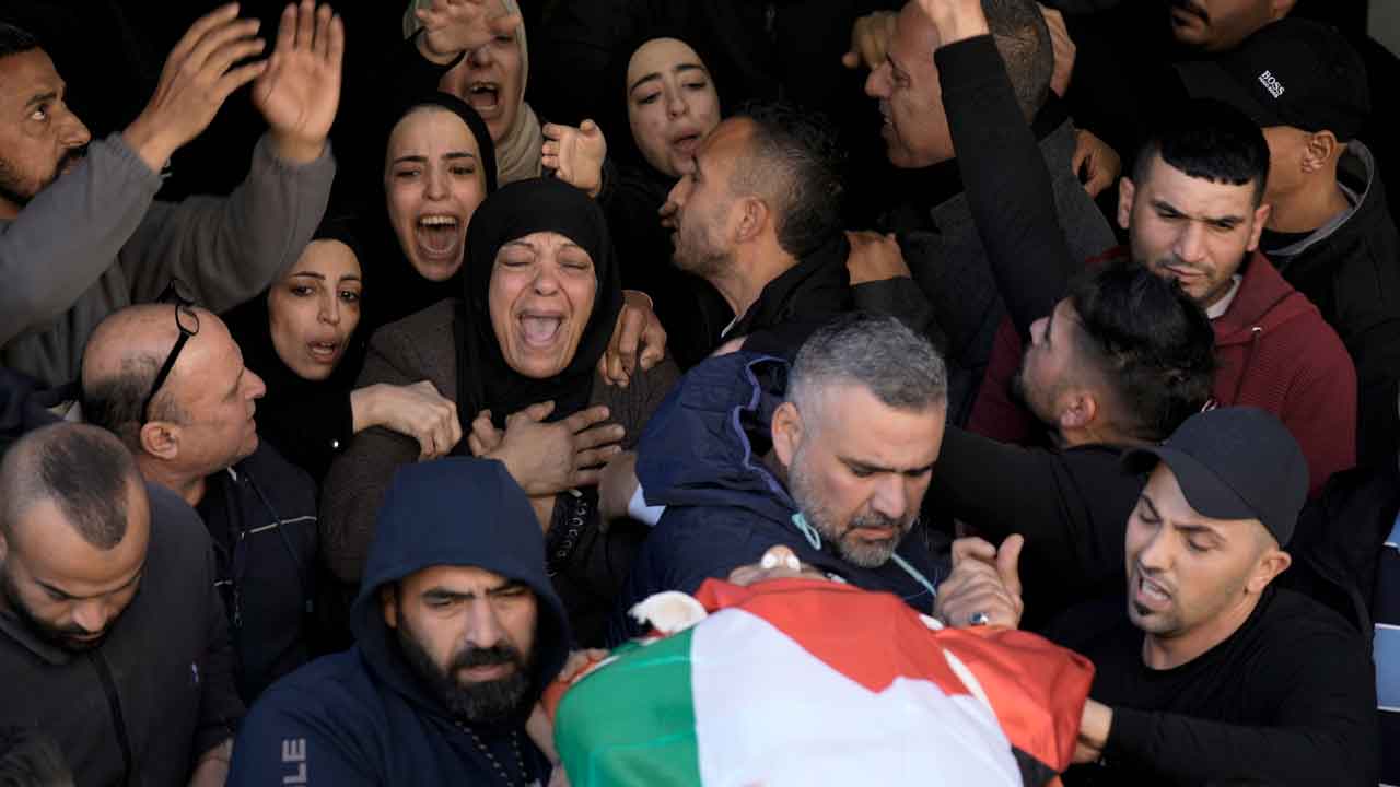 Israeli troops fatally shoot Palestinian teacher, militant during raid ...