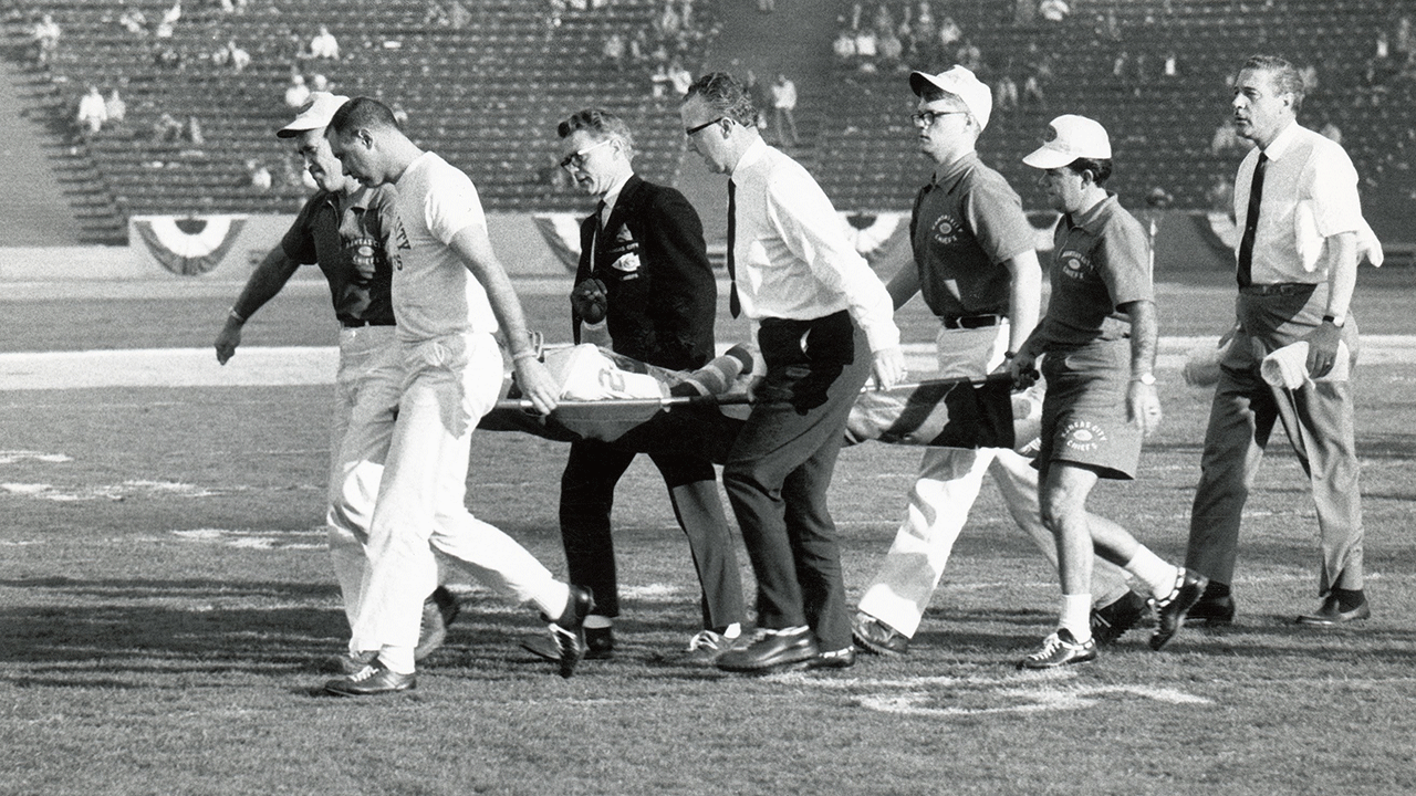 Fred "The Hammer" Williamson of the Kansas City Chiefs brought off the field on a stretcher during Super Bowl I