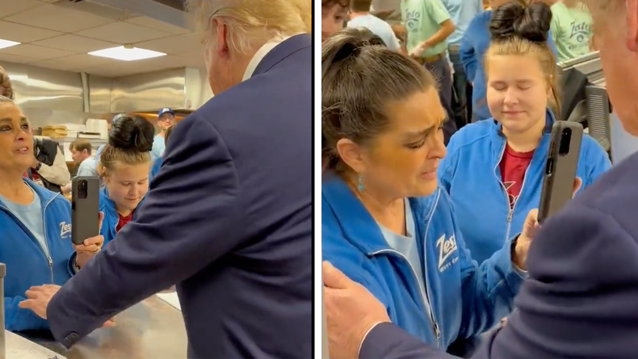 Trump seen praying with South Carolina restaurant employee during campaign stop