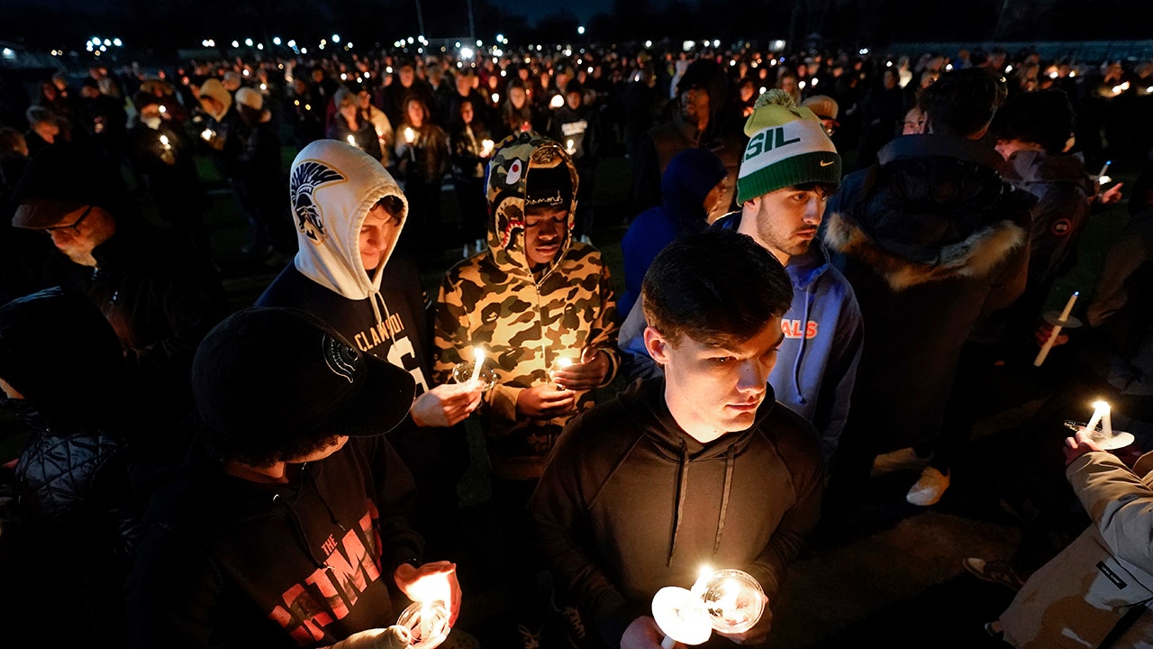 Michigan State reopens after deadly shooting; university will cover victims' funeral costs, hospital bills