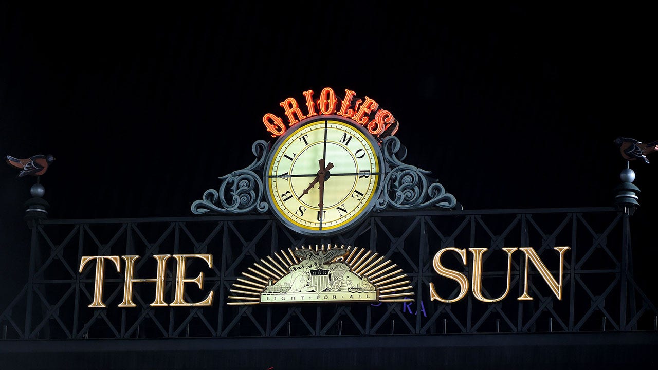 Orioles remove iconic Baltimore Sun sign from Camden Yards scoreboard
