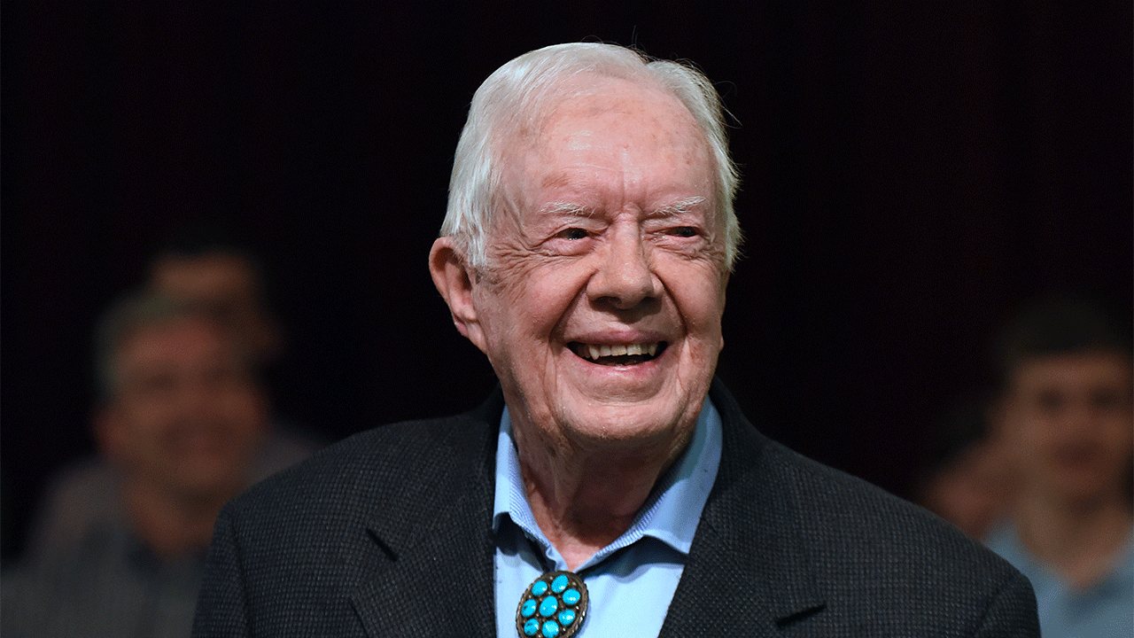 Former U.S. President Jimmy Carter speaks to the congregation at Maranatha Baptist Church before teaching Sunday school in his hometown of Plains, Georgia on April 28, 2019. Carter, 94, has taught Sunday school at the church on a regular basis since leaving the White House in 1981, drawing hundreds of visitors who arrive hours before the 10:00 am lesson in order to get a seat and have a photograph taken with the former President and former First Lady Rosalynn Carter.