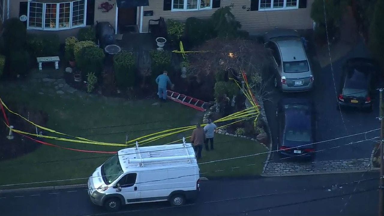 Sinkhole in New York woman's front yard swallows her and 2 people; all rescued, police say