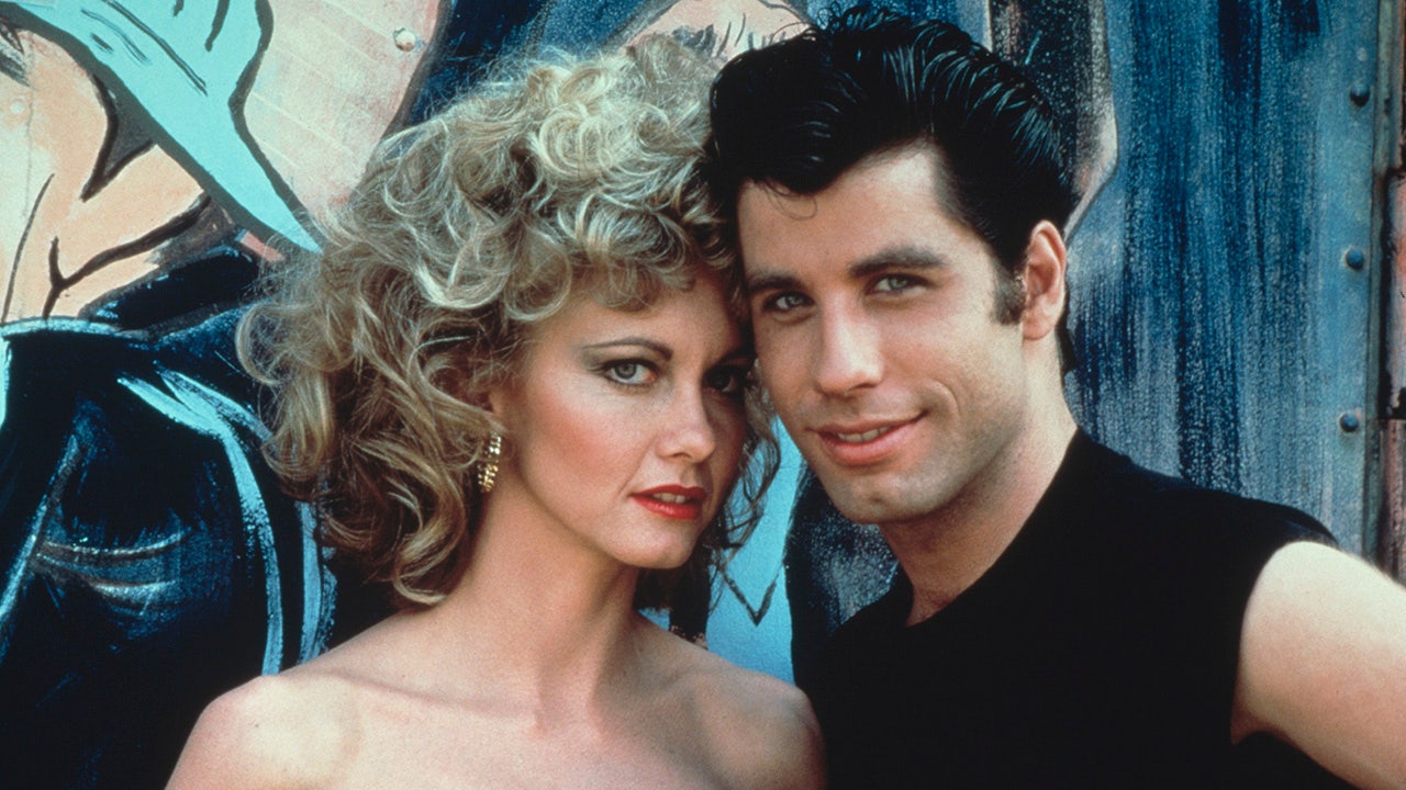 Australian singer and actress Olivia Newton-John and American actor John Travolta as they appear in the Paramount film 