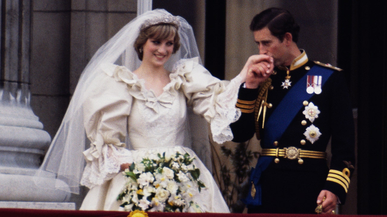 Princess Diana and Charles on their wedding day at Buckingham Palace