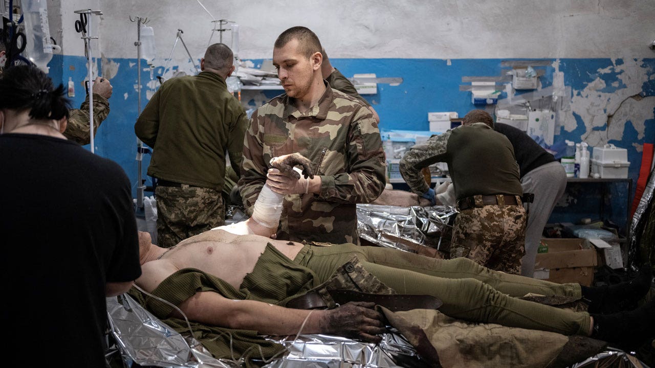 Ukrainian army medics fight to save lives near frontline