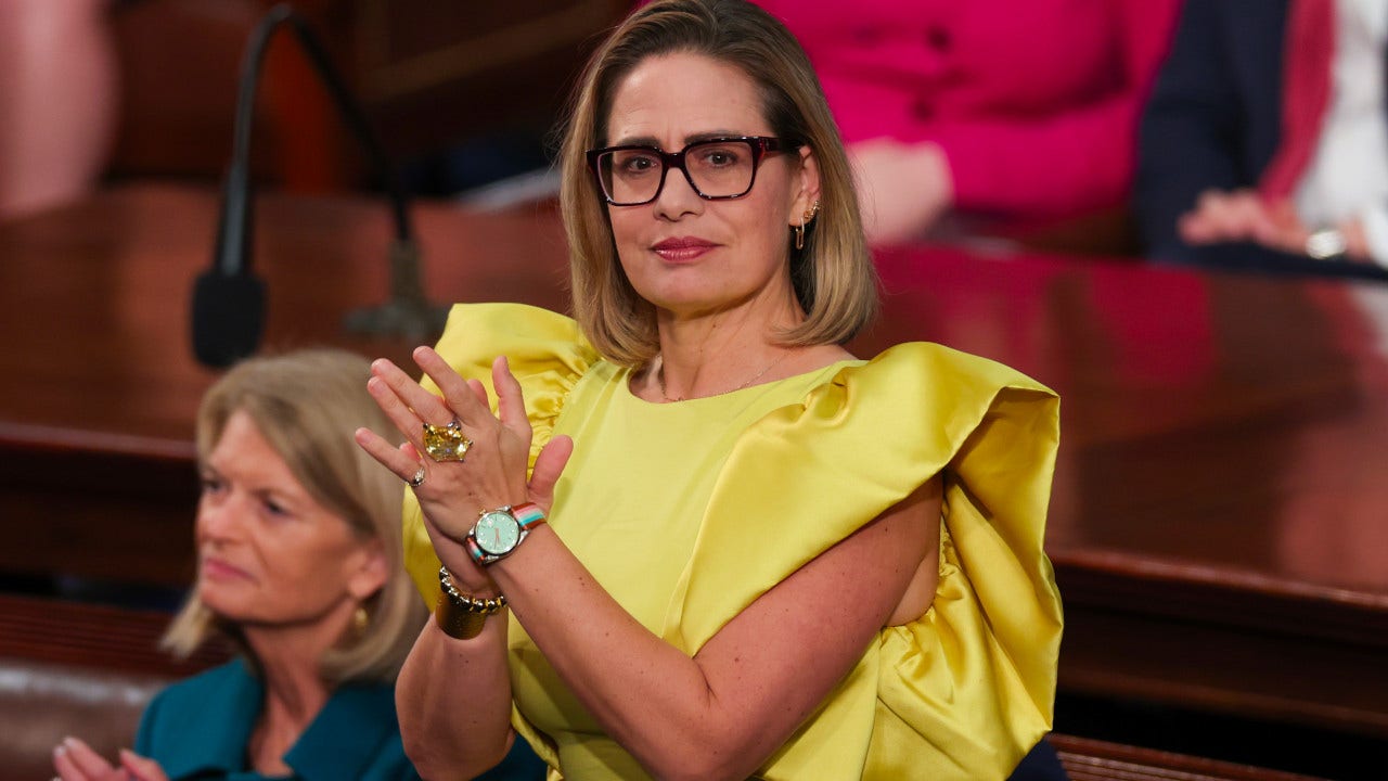 Kyrsten Sinema’s yellow dress at SOTU sparks hot takes across Twitter