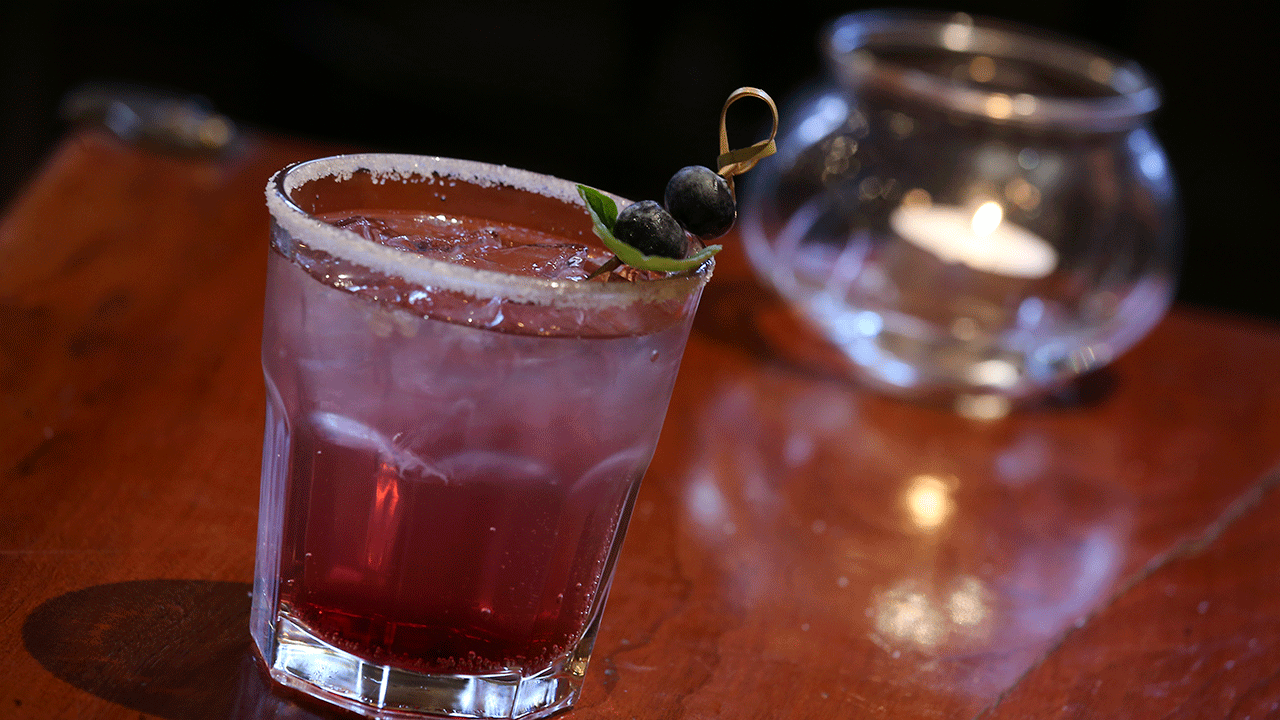 This blueberry margarita is a fruity twist on the classic drink.