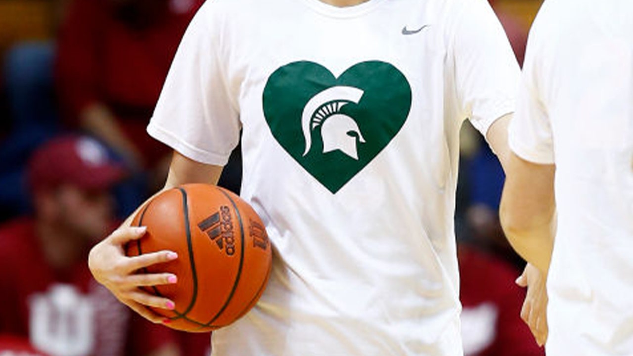Michigan to put Michigan State rivalry aside in first basketball game following school shooting
