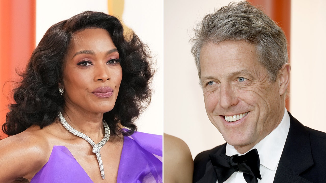 Angela Bassett and Hugh Grant were both criticized for their behavior at the 95th Academy Awards carpet and show. (Kevin Mazur/Mike Coppola)