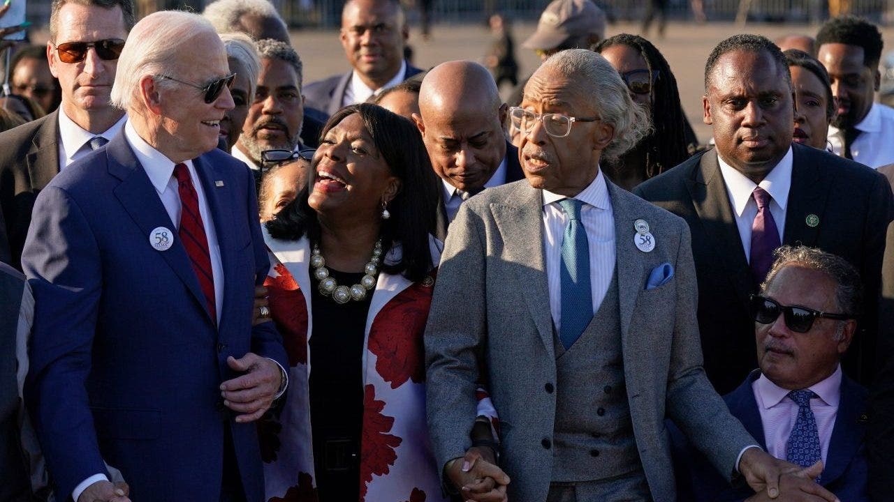 Biden urged to ‘choose more worthy allies’ after marching with Sharpton in Selma