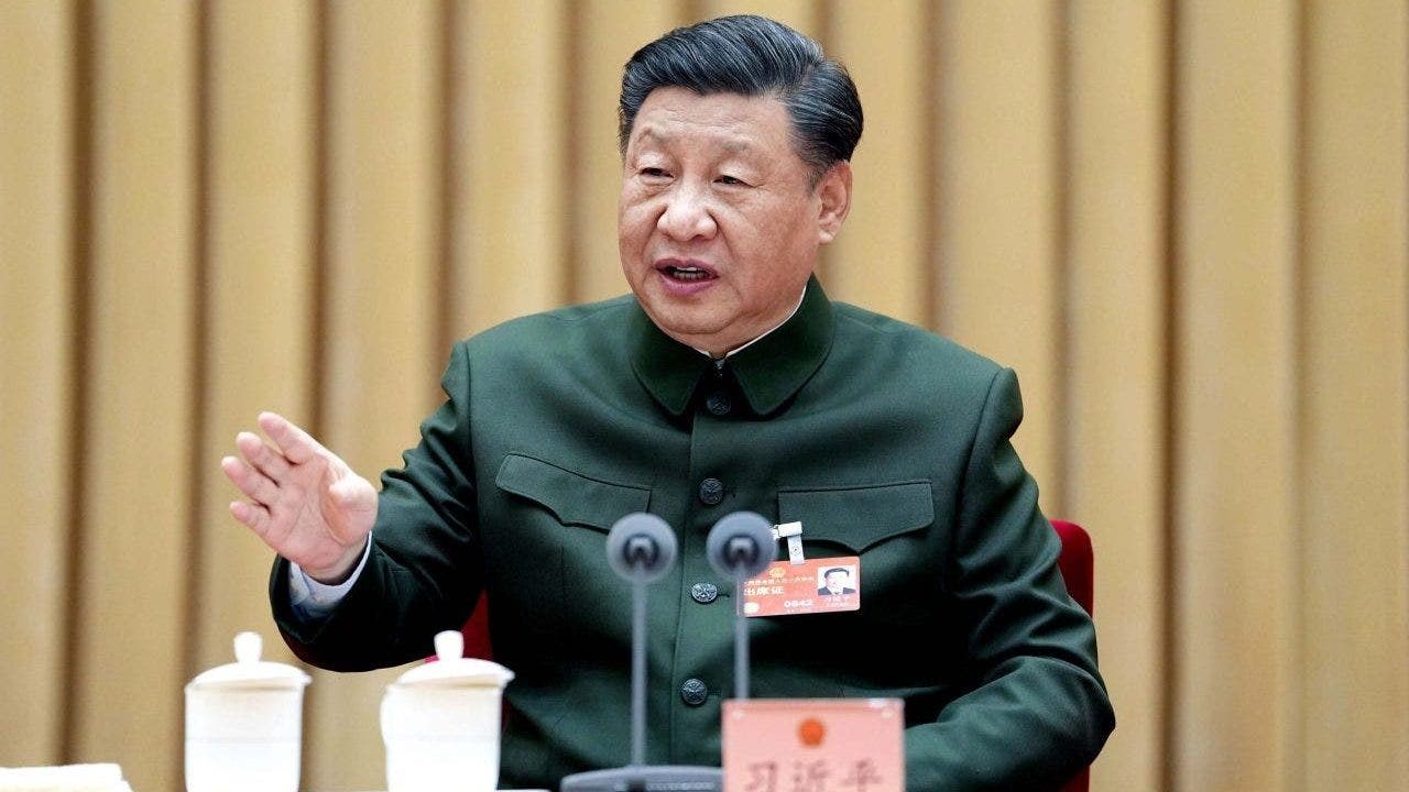 China's Xi demands rapid military upgrade to 'world class standards'