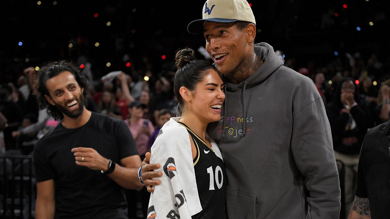 Kelsey Plum of the Las Vegas Aces celebrates during the 2022 WNBA