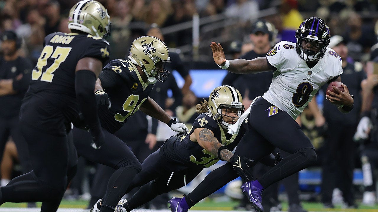 New Orleans, Louisiana,, November 7, 2022. New Orleans Saints safety Tyrann  Mathieu (32) tackles Baltimore Ravens quarterback Lamar Jackson (8) during  a National Football League game at Caesars Superdome in New Orleans