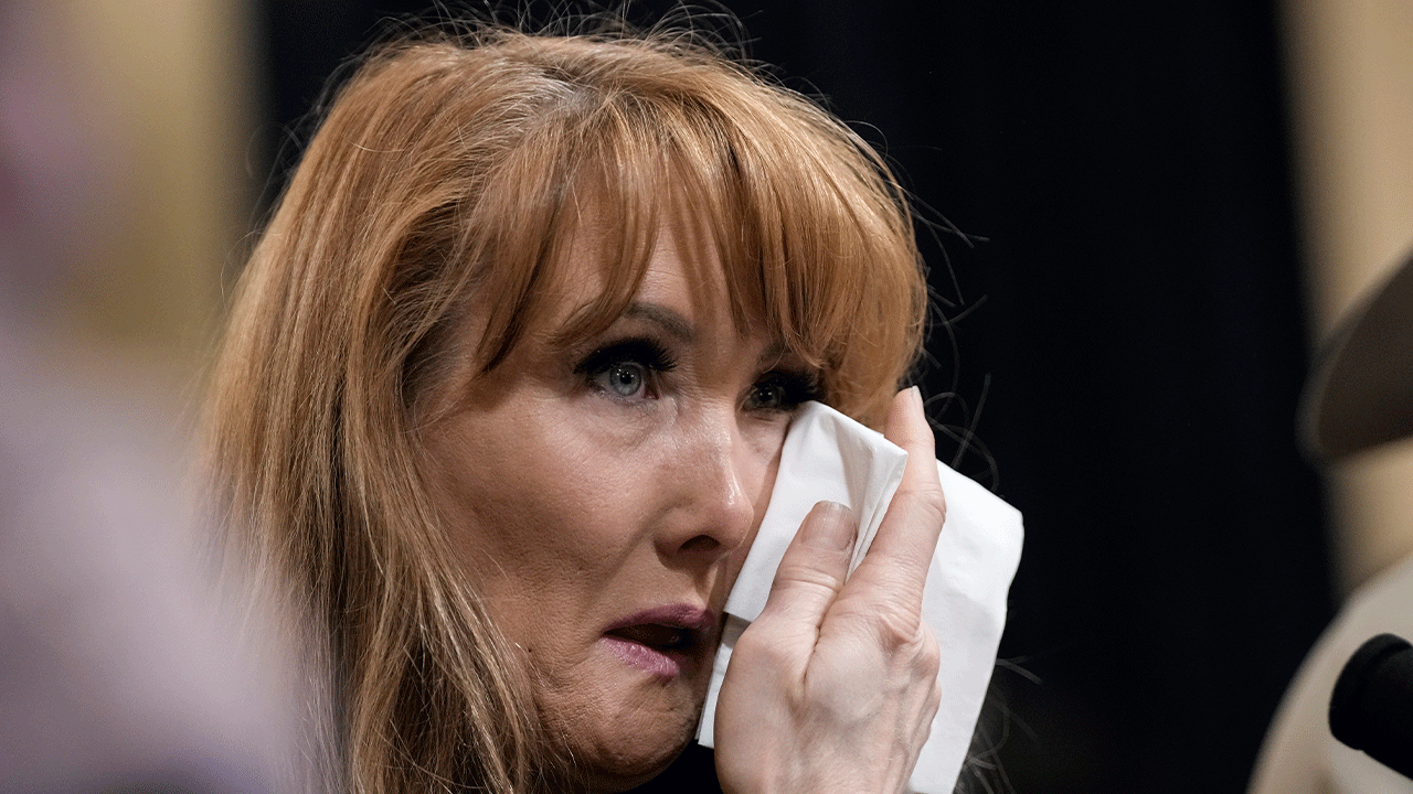 Rebecca Kiessling, a mother from Michigan who lost two sons to fentanyl poisoning, wipes away tears during a House Homeland Security Committee about the U.S-Mexico border on Capitol Hill February 28, 2023 in Washington, DC. This is the committee's first hearing on border security since the Republicans took control of the House.