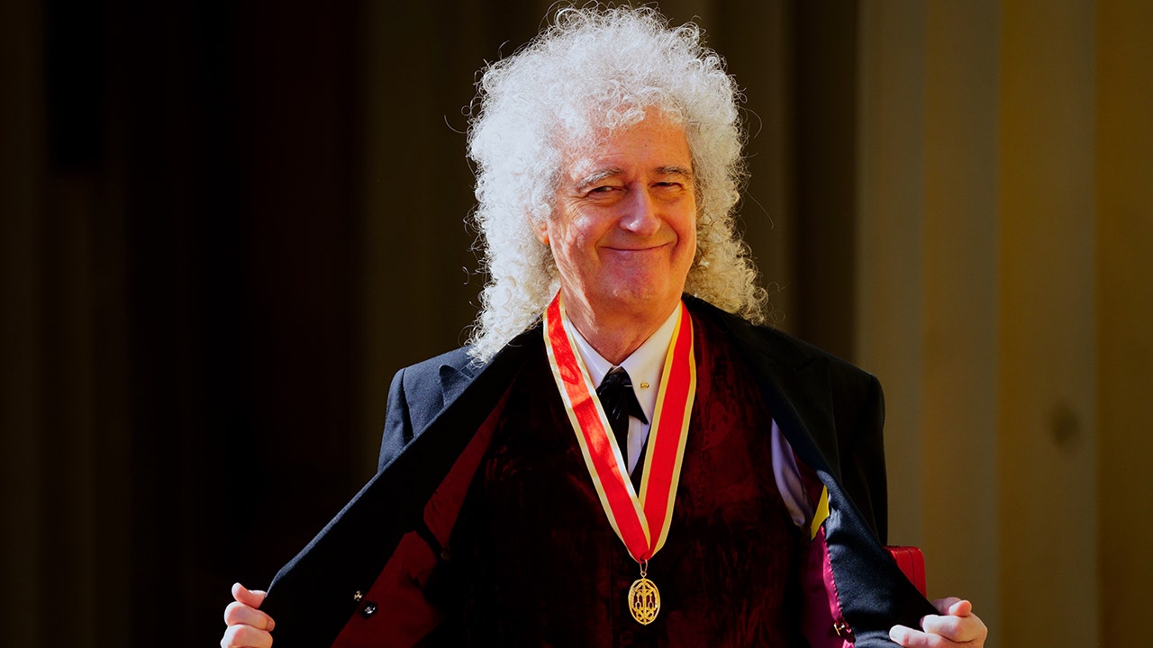 King Charles knights Queen guitarist Brian May