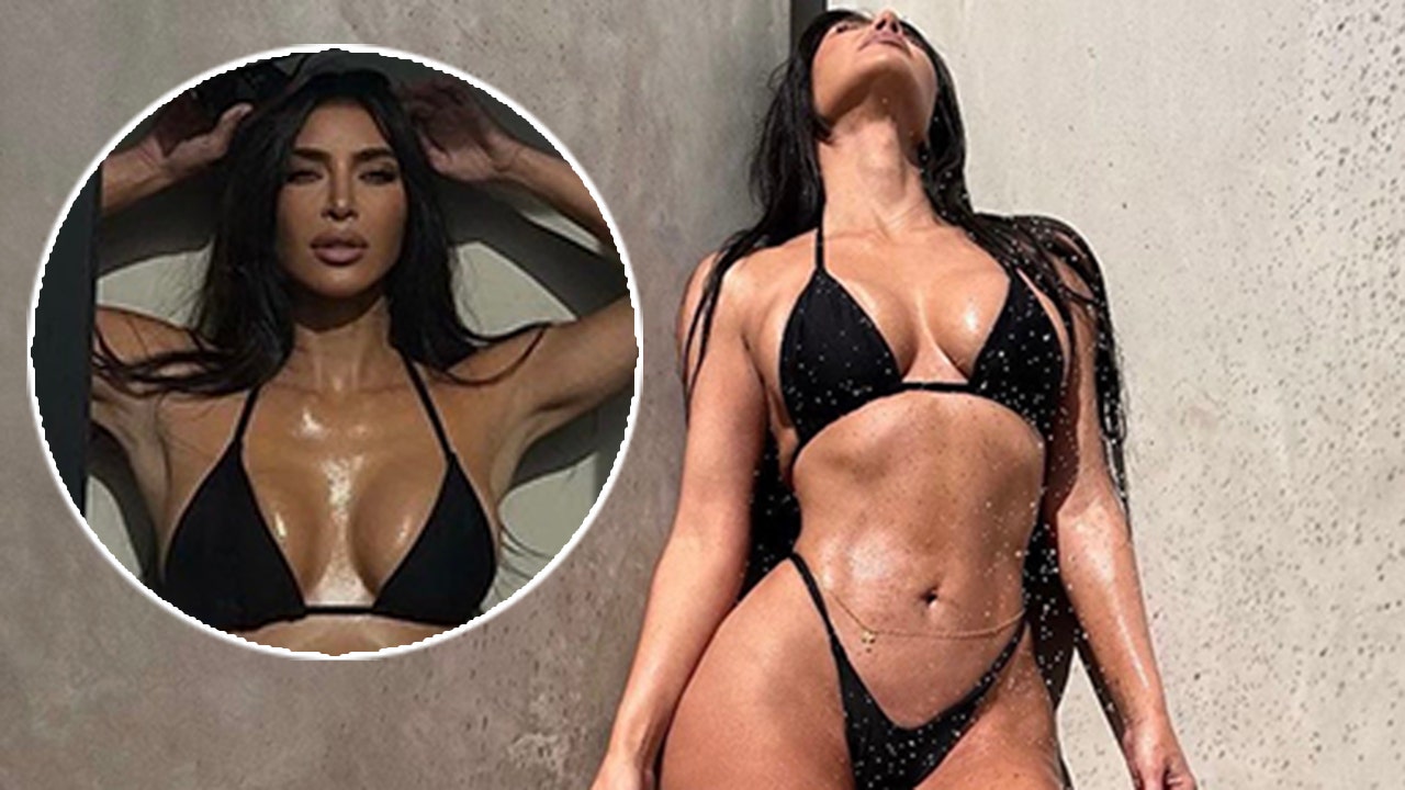 Kim Kardashian sizzles in tiny bikini in new shower photos as fans