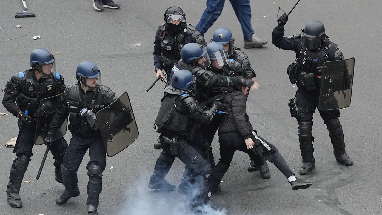 Macron under fire as French protests turn violent over increased ...