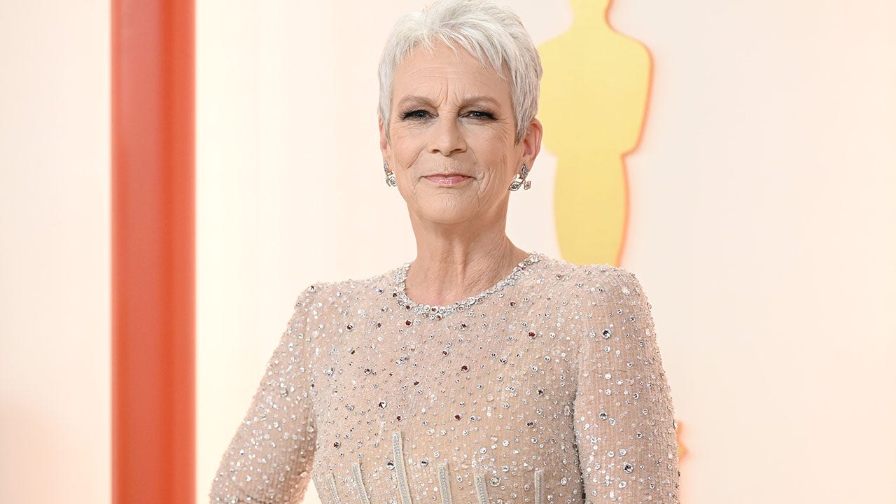 Jamie Lee Curtis goes sheer in rhinestone dress at Oscars