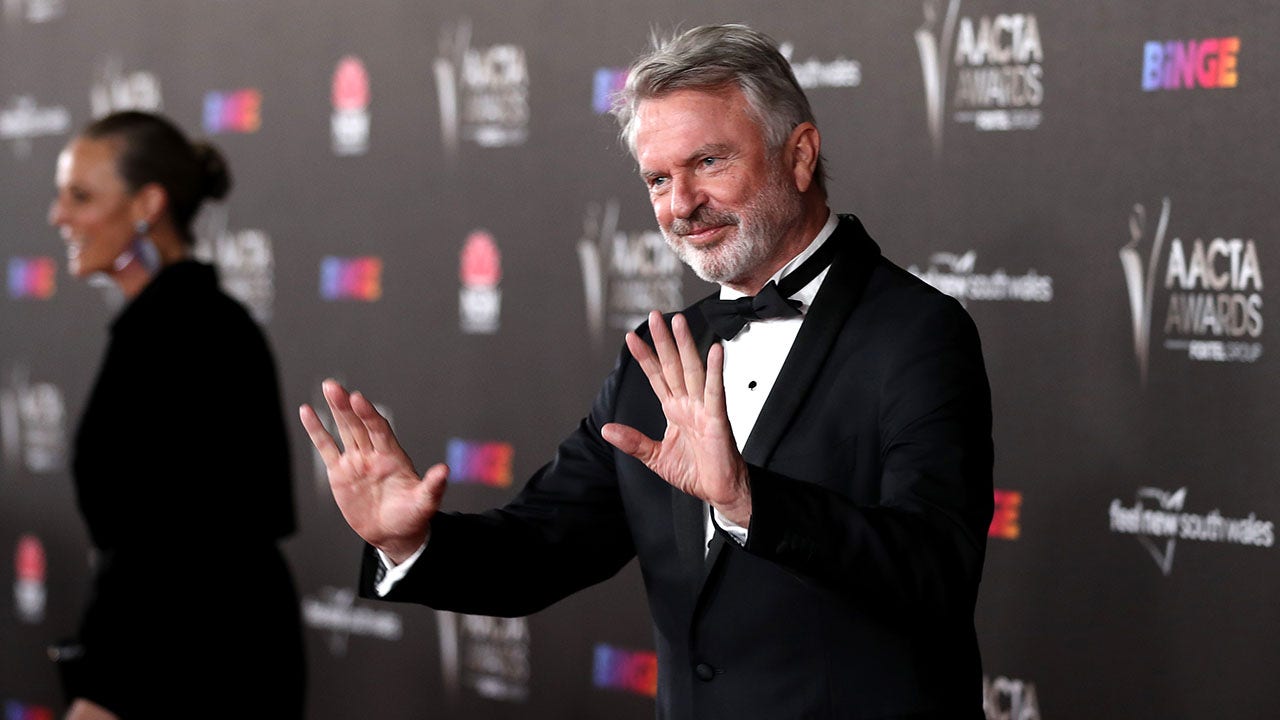 Sam Neill assures fans he's ‘alive and well’ and in remission after his cancer news