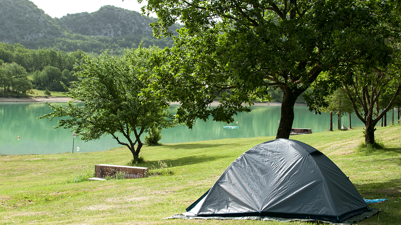 A tent set up on the grass