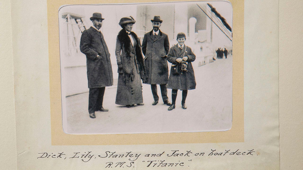 A picture from Stanley May's scrapbook. May is shown at center right, with his brother Dick on the left, their sister Lily Odell second from left and nephew Jack, far right, on the deck of the Titanic. A letter from May - a lucky Titanic survivor - describing the 