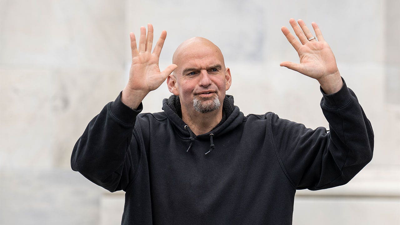 PHOTOS: Fetterman returns to Senate in sweatshirt, shorts after months-long hospital stay