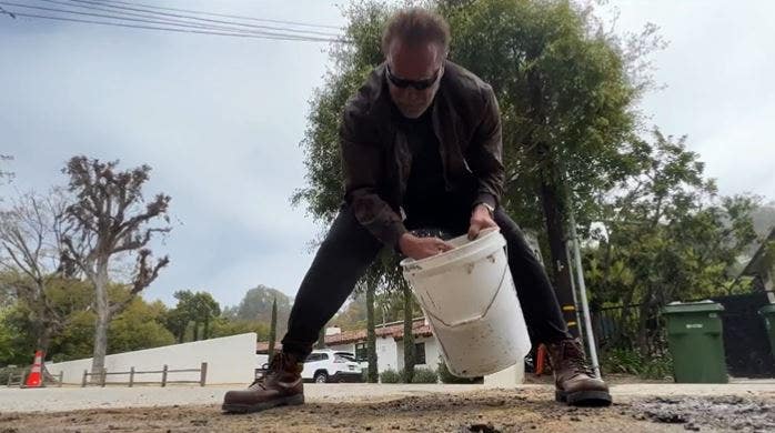Arnold Schwarzenegger fills in neighborhood pothole himself after 'waiting' for three weeks: ‘This is crazy’