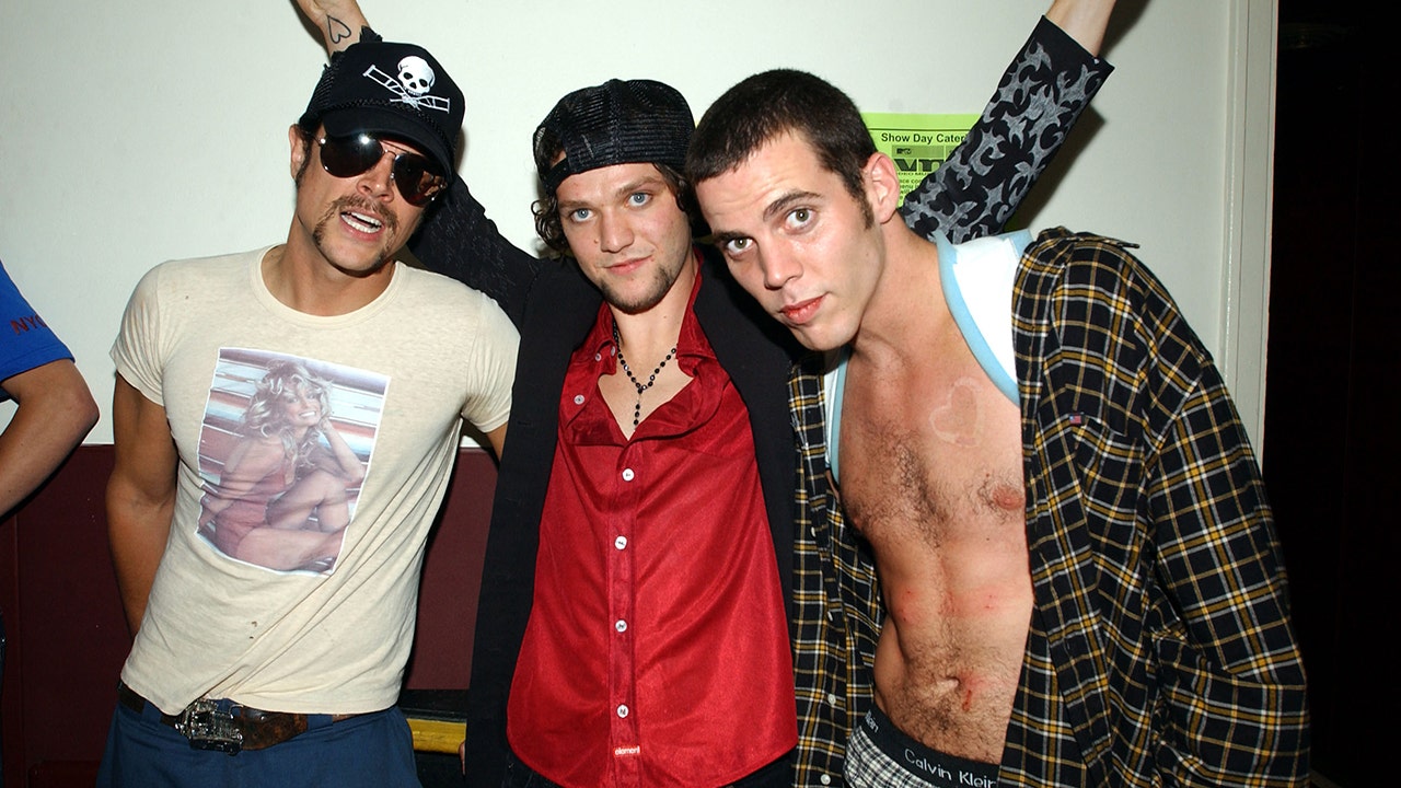 Bam Margera poses with Johnny Knoxville and Steve-O at MTV Video Awards