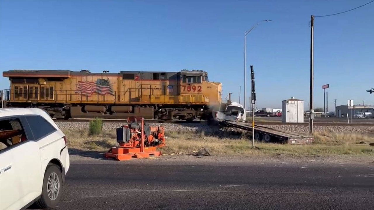 Texas freight train smashes into pickup truck after fatal crash: watch video