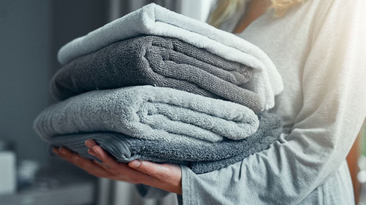 Should You Store Towels in the Bathroom? Experts Weigh In