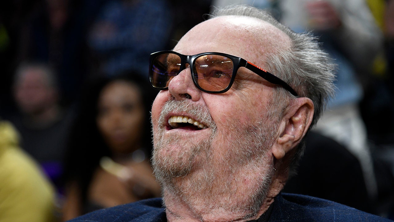Jack Nicholson cheers courtside for Los Angeles Lakers' playoff game