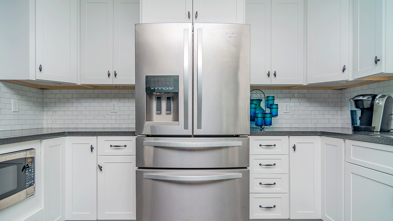 A modern white colored kitchen